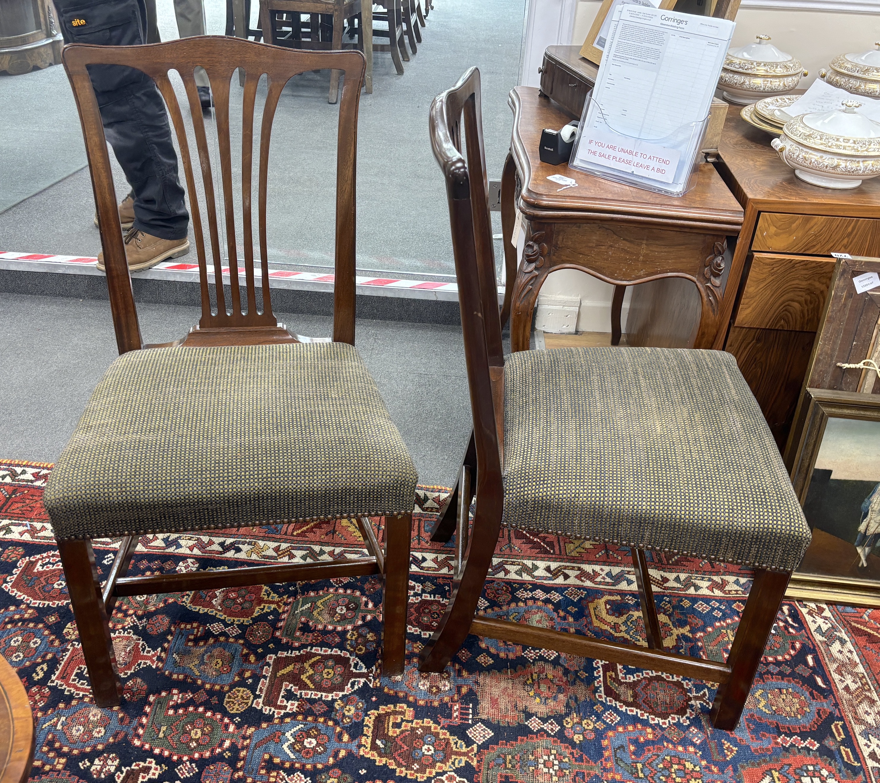A set of twelve reproduction George III style mahogany dining chairs, ten single, two elbow chairs